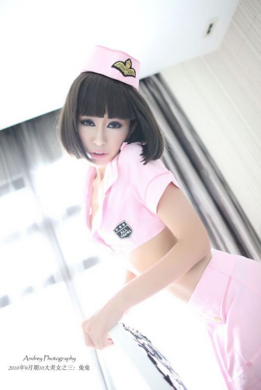 妩媚空姐制服美女私房美胸性感写真